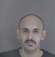 Man arrested on weapon, drug charges after foot chase