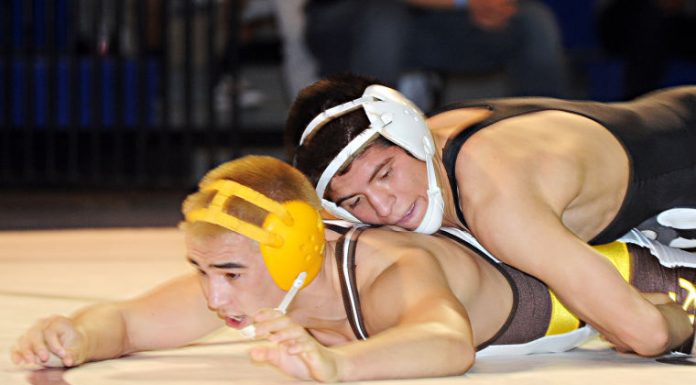Prep Wrestling: Mustangs break team record, win 12th straight title