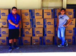 High school students collect shoes for needy
