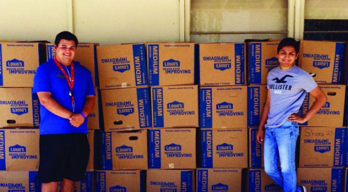 High school students collect shoes for needy