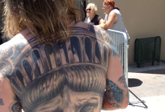 Local man shows off body-length ‘Liberty’ tattoo at rally