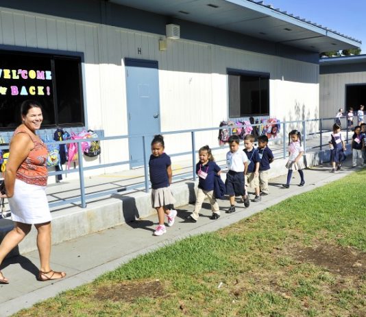 Custodian prevents spread of fire at school