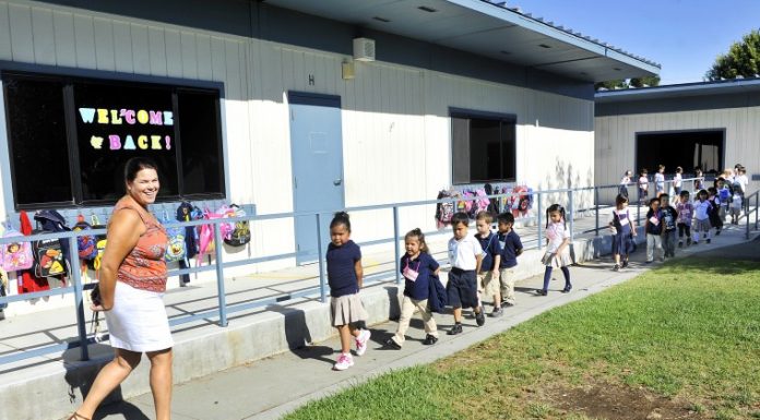 Custodian prevents spread of fire at school