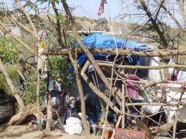 Encampment along riverbed brings ‘level of complexity’
