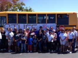 Bus campaign drives school supplies to needy