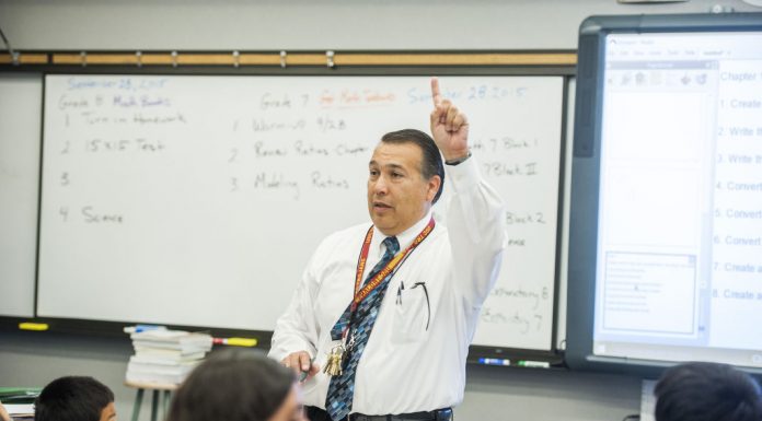 With shortage, top administrator heads back to classroom