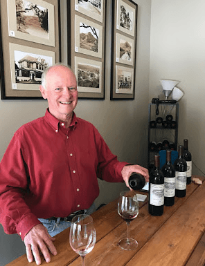 claude solons paradise valley vineyards pouring wine at Hiram Morgan Hill house