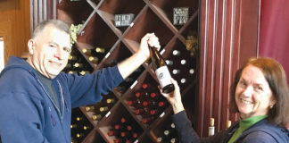 RELAXED SETTING Mike and Maryclaire Sampognaro, owners of Morgan Hill Cellars, create a comfortable, fun space in their winery. Photo: Bev Stenehjem