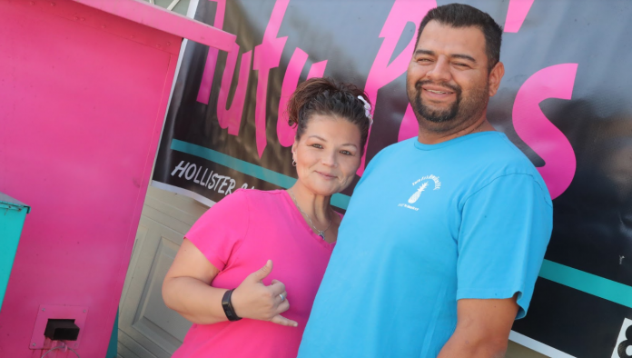 Kulia and Lupe Lemus with their catering barbecue.