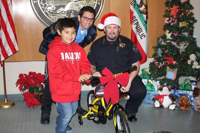 Cops spread joy with bike giveaway