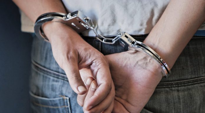 Man arrested on suspicion of gun, drug offenses