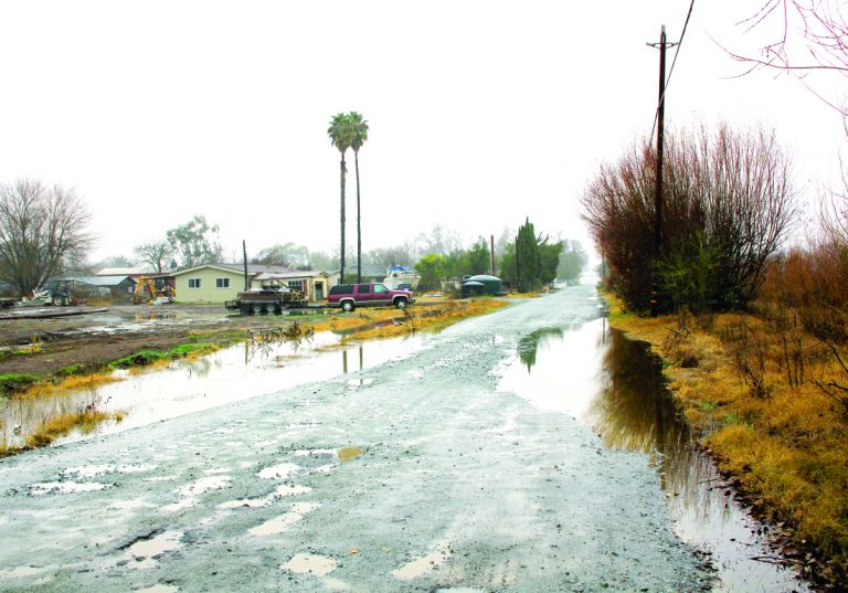 Local levee fixed one year later