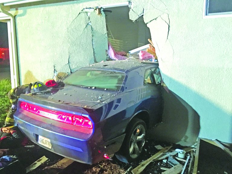 DUI suspect crashes into house