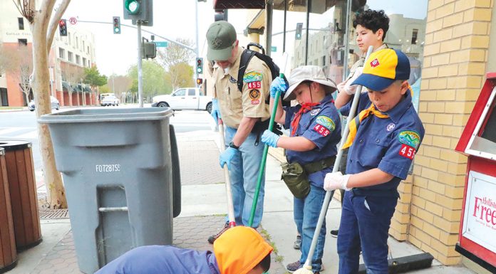 Volunteers spruce up downtown