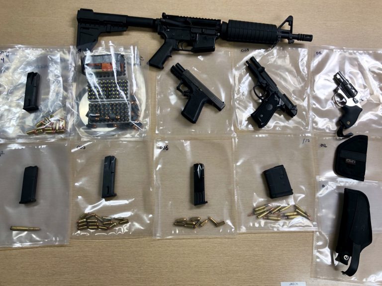 Weapons standoff ends peaceably