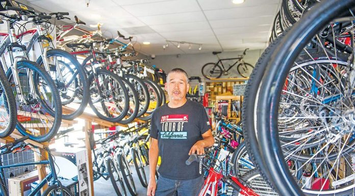 Bike shop’s green efforts recognized