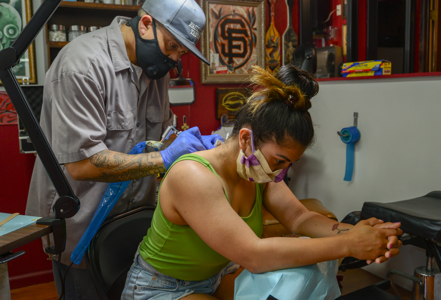 Ink begins to flow again at tattoo shops