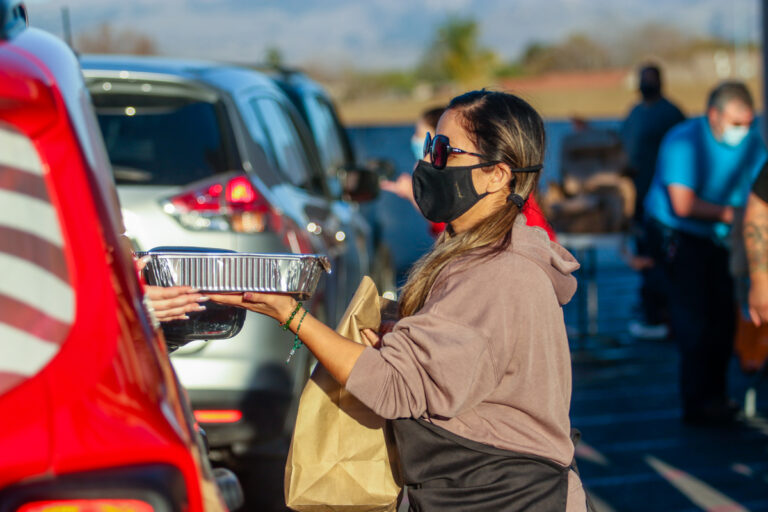 Hollister community members receive free spaghetti meals