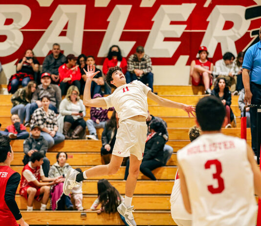 Hollister High boys volleyball team spiking the competition