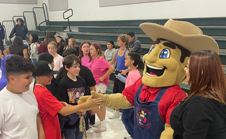 High schoolers mentor Ladd Lane students on attendance