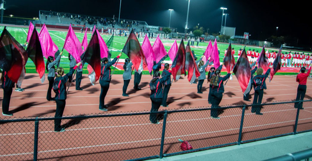 Image for display with article titled Crossover Unites Hollister School Bands, Color Guards