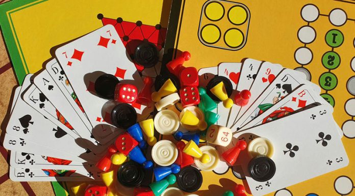 Playing Games in San Benito County: Where Can You Do It? Various board games, game pieces, dices and playing cards